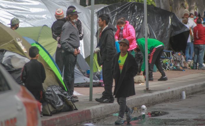 enfermedades, campamento, migrantes, salud